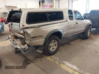 2003 Toyota Tacoma with VIN 5TEWN72N63Z262770, listed as a IAAI auction lot 41599128 with 329,377 mi miles. Bid and sale history available at carsss.com. Image 4.