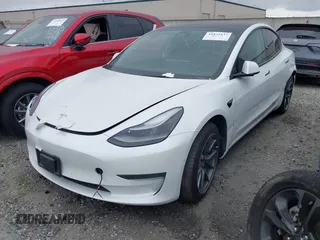 2022 Tesla Model 3 with VIN 5YJ3E1EA7NF108758, listed as a IAAI auction lot 41824437 with Not Provided miles. Bid and sale history available at carsss.com. Image 25.