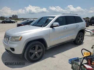2011 Jeep Grand Cherokee Overland Summit with VIN 1J4RR6GT8BC608750, listed as a Copart auction lot 59347475 with 212,585 mi miles and Salvage title. Bid and sale history available at DreamBid. Image 1.