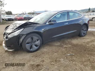 2019 Tesla Model 3 Mid Range with VIN 5YJ3E1EA3KF399335, listed as a Copart auction lot 49005185 with 38,270 mi miles and Salvage Title. Bid and sale history available at carsss.com. Image 1.
