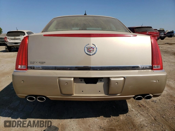 2006 Cadillac DTS 1SD z VIN 1G6KD57Y16U117113, wystawiony jako Copart lot #71485044 z przebiegiem 109 948 mil mil oraz Szkoda całkowita • Salvage title. Historia ofert i sprzedaży dostępna na DreamBid. Obrazek 6.