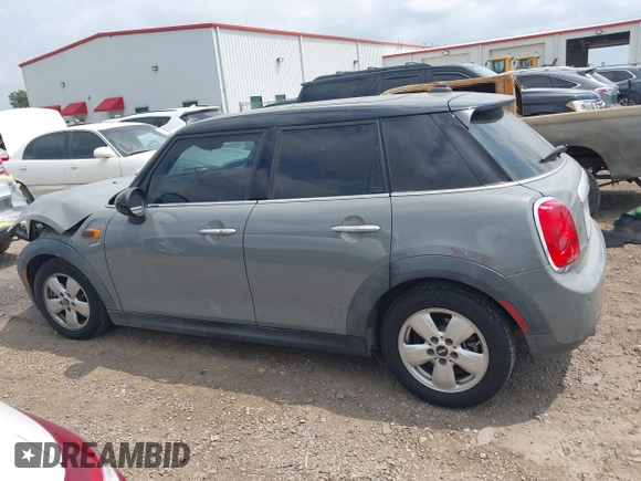 2015 MINI Hardtop 4 Door with VIN WMWXS5C56FT830418, listed as a IAAI auction lot 42132285 with 111,428 mi miles and . Bid and sale history available at DreamBid. Image 14.