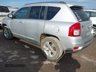 2011 Jeep Compass with VIN 1J4NT1FB4BD252724, listed as a IAAI auction lot 41247389 with 162,028 mi miles. Bid and sale history available at carsss.com. Image 3.