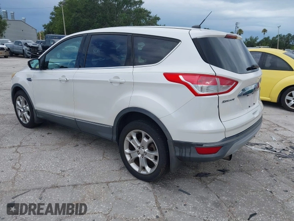2013 Ford Escape SEL z VIN 1FMCU9HX5DUC33079, wystawiony jako IAAI lot #42521744 z przebiegiem 133 864 mil mil oraz . Historia ofert i sprzedaży dostępna na DreamBid. Obrazek 3.