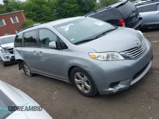 2015 Toyota Sienna LE AAS with VIN 5TDKK3DC0FS588089, listed as a IAAI auction lot 42501791 with 190,322 mi miles and . Bid and sale history available at DreamBid. Image 1.