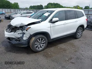 2020 Honda Pilot EX-L z VIN 5FNYF6H57LB067852, wystawiony jako IAAI lot #42172590 z przebiegiem 109 026 mil mil oraz . Historia ofert i sprzedaży dostępna na DreamBid. Obrazek 21.