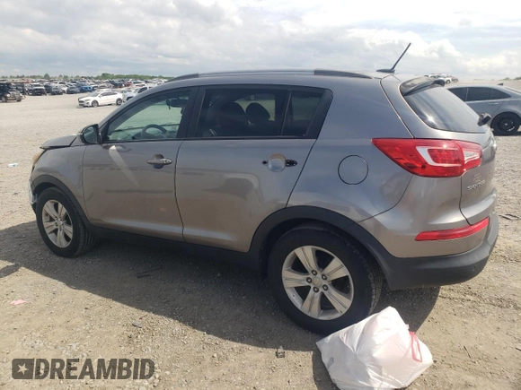 2011 Kia Sportage LX z VIN KNDPB3A2XB7062218, wystawiony jako Copart lot #54433555 z przebiegiem 132 819 mil mil oraz Szkoda całkowita • Salvage title. Historia ofert i sprzedaży dostępna na DreamBid. Obrazek 2.