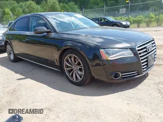 2011 Audi A8 with VIN WAURVAFD6BN005425, listed as a IAAI auction lot 42623409 with 264,365 mi miles and . Bid and sale history available at DreamBid. Image 1.