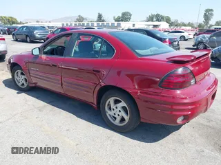 1999 Pontiac Grand Am SE2 with VIN 1G2NE52T0XM702788, listed as a IAAI auction lot 42564414 with 195,067 mi miles and . Bid and sale history available at DreamBid. Image 3.