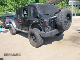 2015 Jeep Wrangler Unlimited Sport with VIN 1C4BJWDG2FL518487, listed as a IAAI auction lot 42593022 with 161,991 mi miles and . Bid and sale history available at DreamBid. Image 3.