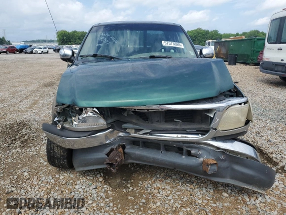 1999 Ford F-150 с VIN 1FTZX1723XNB11655, выставлен на аукционе Copart как лот 57573695 с пробегом Не указан миль и Списание • Salvage title. История ставок и продаж доступна на DreamBid. Изображение 5.