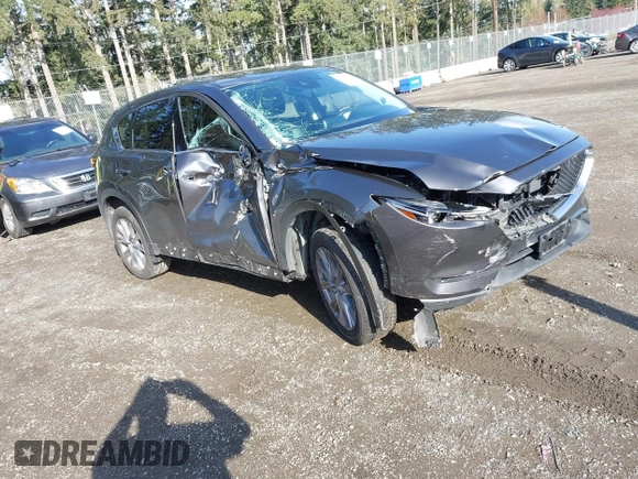 2019 Mazda CX-5 Grand Touring with VIN JM3KFBDM3K1677208, listed as a IAAI auction lot 41929299 with 58,163 mi miles. Bid and sale history available at carsss.com. Image 1.
