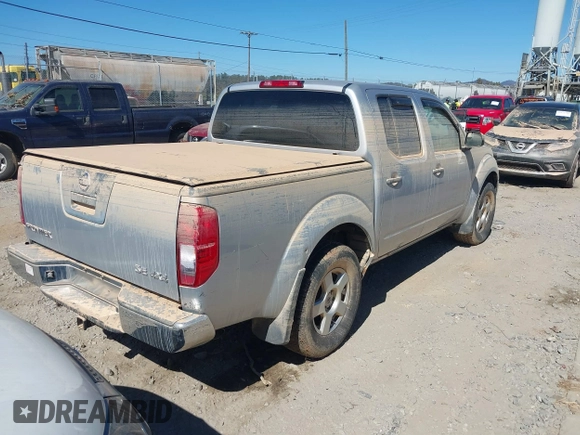 2006 Nissan Frontier SE z VIN 1N6AD07W36C443203, wystawiony jako IAAI lot #40571911 z przebiegiem Nie podano mil oraz . Historia ofert i sprzedaży dostępna na DreamBid. Obrazek 4.