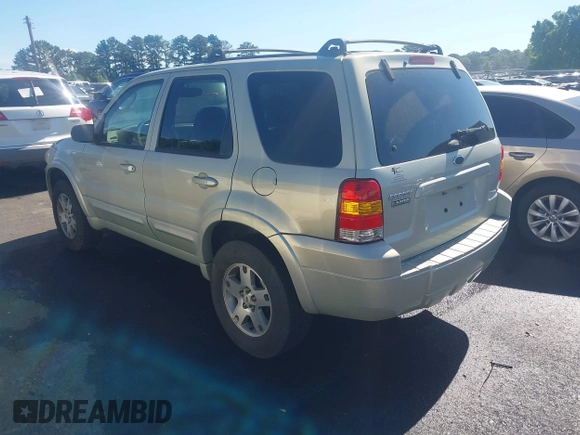 2005 Ford Escape Limited with VIN 1FMYU04135KA96157, listed as a IAAI auction lot 42339869 with 202,712 mi miles and . Bid and sale history available at DreamBid. Image 3.