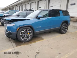 2023 Rivian R1S Adventure with VIN 7PDSGABA7PN023703, listed as a Copart auction lot 83855414 with 13,300 mi miles and Salvage Title. Bid and sale history available at carsss.com. Image 1.
