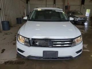 2018 Volkswagen Tiguan SEL z VIN 3VV2B7AX9JM182885, wystawiony jako Copart lot #60194295 z przebiegiem 101 861 mil mil oraz Czysty tytuł • Clean title. Historia ofert i sprzedaży dostępna na DreamBid. Obrazek 5.