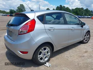 2016 Ford Fiesta SE with VIN 3FADP4EJ7GM121143, listed as a IAAI auction lot 42242739 with 142,351 mi miles and . Bid and sale history available at carsss.com. Image 4.