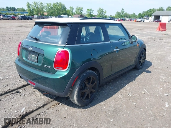 2016 MINI Hardtop with VIN WMWXP5C52G2D14536, listed as a IAAI auction lot 42565690 with 62,682 mi miles and . Bid and sale history available at DreamBid. Image 4.