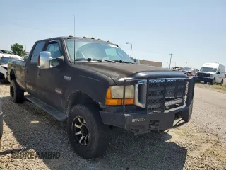 2000 Ford F-350 XL with VIN 1FTSW31F3YEB20854, listed as a Copart auction lot 61717865 with 209,288 mi miles and Salvage title. Bid and sale history available at DreamBid. Image 4.
