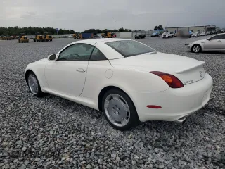 2003 Lexus SC 430 with VIN JTHFN48Y030045309, listed as a Copart auction lot 59034585 with 104,167 mi miles and Salvage title. Bid and sale history available at DreamBid. Image 2.