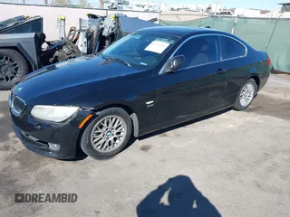 2011 BMW 3 Series 328i xDrive with VIN WBAKF5C58BE654906, listed as a IAAI auction lot 41725240 with 123,743 mi miles. Bid and sale history available at carsss.com. Image 2.