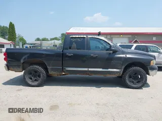 2007 Dodge 1500 Laramie z VIN 1D7HU18267S236613, wystawiony jako IAAI lot #42477167 z przebiegiem 267 376 mil mil oraz . Historia ofert i sprzedaży dostępna na DreamBid. Obrazek 13.