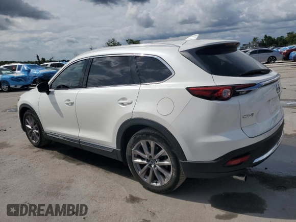 2021 Mazda CX-9 Grand Touring with VIN JM3TCADY7M0501717, listed as a Copart auction lot 59402875 with 53,218 mi miles and Salvage title. Bid and sale history available at DreamBid. Image 2.