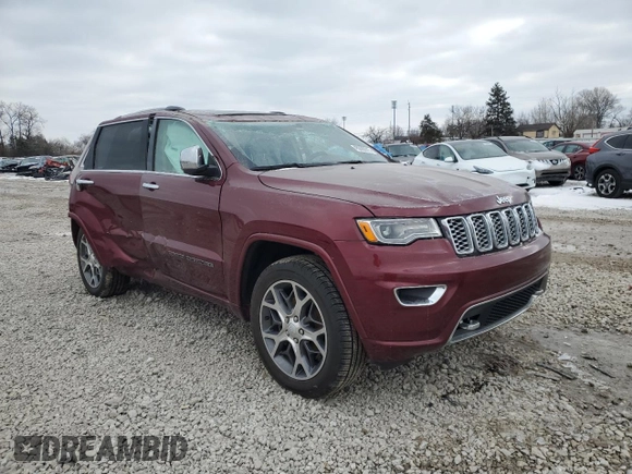2020 Jeep Grand Cherokee Overland with VIN 1C4RJFCG2LC327390, listed as a Copart auction lot 45600615 with 121,504 mi miles and Salvage Title. Bid and sale history available at carsss.com. Image 4.