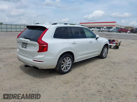 2017 Volvo XC90 with VIN YV4A22PK0H1119042, listed as a IAAI auction lot 42168686 with 129,882 mi miles and . Bid and sale history available at DreamBid. Image 4.