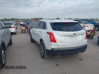 2017 Cadillac XT5 Luxury FWD with VIN 1GYKNBRS2HZ108745, listed as a IAAI auction lot 42022579 with 147,413 mi miles. Bid and sale history available at carsss.com. Image 3.