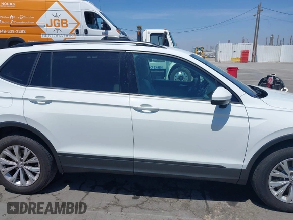 2019 Volkswagen Tiguan S with VIN 3VV1B7AX1KM101407, listed as a IAAI auction lot 42032761 with 51,868 mi miles and . Bid and sale history available at DreamBid. Image 13.
