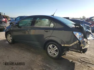 2014 Chevrolet Sonic LT with VIN 1G1JC5SH7E4220059, listed as a Copart auction lot 49877765 with 136,896 mi miles and Salvage Title. Bid and sale history available at DreamBid. Image 2.