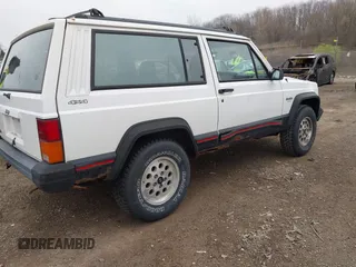 1996 Jeep Cherokee Sport with VIN 1J4FJ67S4TL224743, listed as a IAAI auction lot 42083533 with 253,847 mi miles. Bid and sale history available at carsss.com. Image 4.