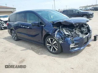 2020 Honda Odyssey Elite z VIN 5FNRL6H93LB057755, wystawiony jako IAAI lot #42067222 z przebiegiem 77 183 mil mil oraz . Historia ofert i sprzedaży dostępna na DreamBid. Obrazek 1.