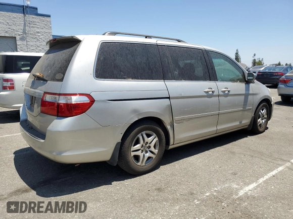 2006 Honda Odyssey EX with VIN 5FNRL38406B453939, listed as a Copart auction lot 62784155 with 86,635 mi miles and Clean title. Bid and sale history available at DreamBid. Image 3.