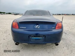 2004 Lexus SC 430 z VIN JTHFN48Y640058289, wystawiony jako Copart lot #55743315 z przebiegiem 157 534 mil mil oraz Szkody całkowita. Historia ofert i sprzedaży dostępna na DreamBid. Obrazek 6.