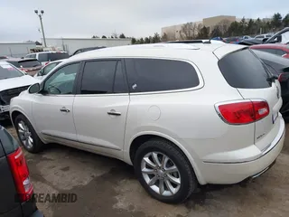 2014 Buick Enclave Premium with VIN 5GAKVCKDXEJ243216, listed as a IAAI auction lot 41709325 with 76,319 mi miles and . Bid and sale history available at DreamBid. Image 14.