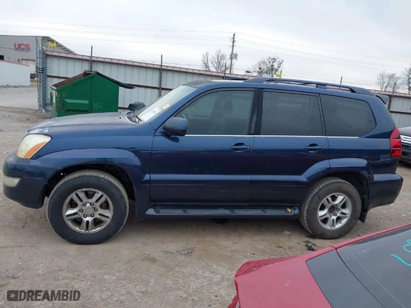 2004 Lexus GX 470 with VIN JTJBT20X340064559, listed as a IAAI auction lot 41240821 with 394,295 mi miles. Bid and sale history available at carsss.com. Image 14.