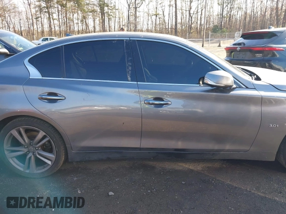 2019 Infiniti Q50 Luxe z VIN JN1EV7AR2KM590794, wystawiony jako IAAI lot #40841640 z przebiegiem 68 720 mil mil oraz . Historia ofert i sprzedaży dostępna na DreamBid. Obrazek 13.