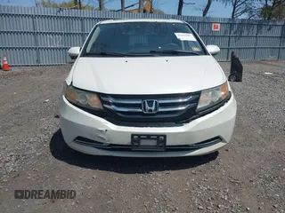 2015 Honda Odyssey EX-L with VIN 5FNRL5H64FB069742, listed as a IAAI auction lot 42101807 with 152,611 mi miles and . Bid and sale history available at DreamBid. Image 12.