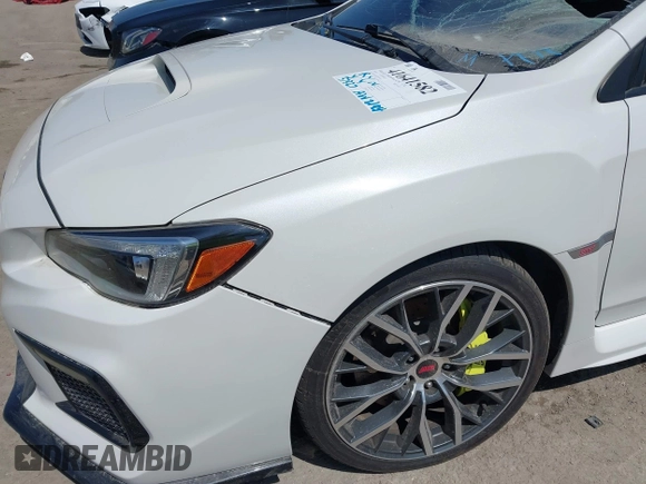 2019 Subaru WRX STI z VIN JF1VA2R6XK9814201, wystawiony jako IAAI lot #41641582 z przebiegiem 57 327 mil mil oraz . Historia ofert i sprzedaży dostępna na DreamBid. Obrazek 17.