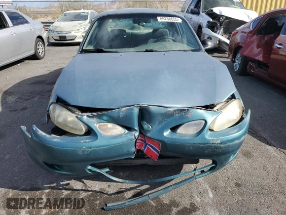 1998 Ford Escort ZX2 z VIN 3FAFP113XWR166304, wystawiony jako Copart lot #55238655 z przebiegiem 257 668 mil mil oraz Szkody całkowita. Historia ofert i sprzedaży dostępna na DreamBid. Obrazek 5.