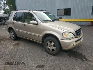 2002 Mercedes-Benz M-Class with VIN 4JGAB54E42A328208, listed as a Copart auction lot 66570984 with 0 mi miles and Salvage Title. Bid and sale history available at carsss.com. Image 4.