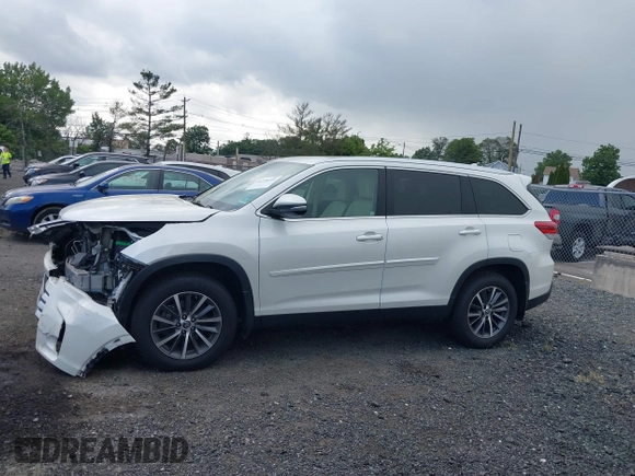 2019 Toyota Highlander SE with VIN 5TDJZRFH1KS567376, listed as a IAAI auction lot 42728105 with 58,970 mi miles and . Bid and sale history available at DreamBid. Image 14.