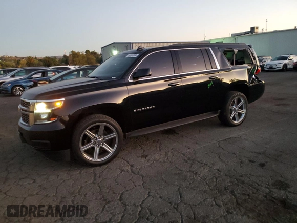 2020 Chevrolet Suburban LS with VIN 1GNSCGKC9LR104008, listed as a Copart auction lot 73351014 with 63,474 mi miles and Salvage title. Bid and sale history available at DreamBid. Image 1.