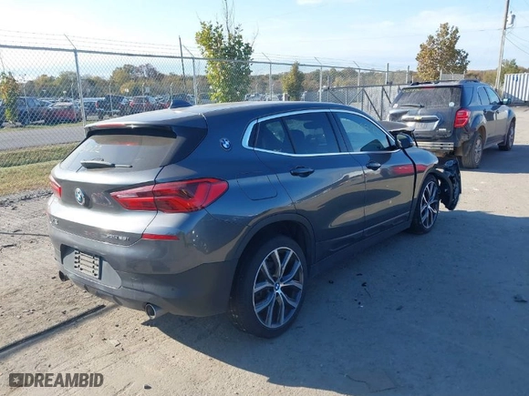 2018 BMW X2 xDrive28i with VIN WBXYJ5C33JEF69549, listed as a IAAI auction lot 40695422 with NaN miles. Bid and sale history available at carsss.com. Image 4.