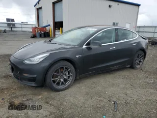 2018 Tesla Model 3 Long Range Battery z VIN 5YJ3E1EB9JF103550, wystawiony jako Copart lot #51776755 z przebiegiem 260 570 mil mil oraz Szkoda całkowita • Salvage title. Historia ofert i sprzedaży dostępna na DreamBid. Obrazek 1.