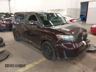2009 Scion xB with VIN JTLKE50E391078402, listed as a IAAI auction lot 41616104 with 119,165 mi miles. Bid and sale history available at carsss.com. Image 1.