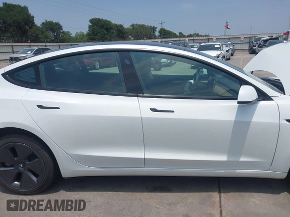2023 Tesla Model 3 z VIN 5YJ3E1EA3PF604076, wystawiony jako IAAI lot #42181964 z przebiegiem 23 207 mil mil oraz . Historia ofert i sprzedaży dostępna na DreamBid. Obrazek 13.