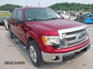 2013 Ford F-150 XL with VIN 1FTFW1ET0DFC26401, listed as a IAAI auction lot 42384748 with 154,075 mi miles and . Bid and sale history available at DreamBid. Image 1.
